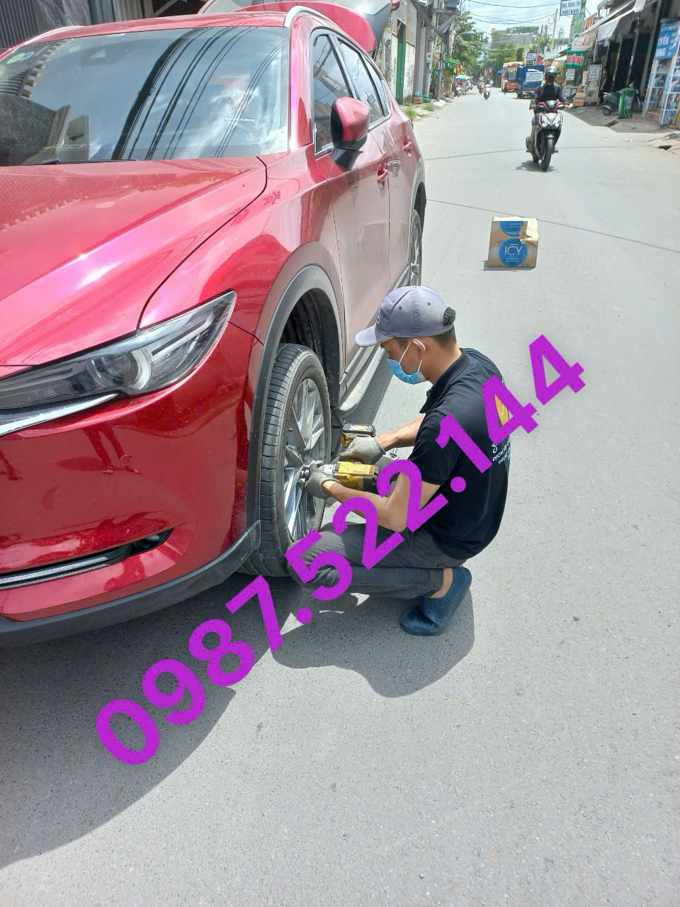 vá lốp Thái Văn Lung